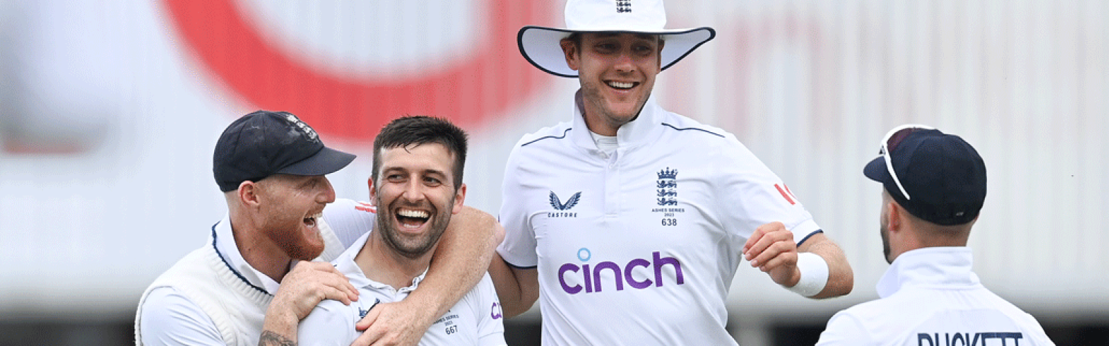 Mark Wood of England celebrates with Ben Stokes, Stuart Broad and Ben Duckett after taking the wicket
