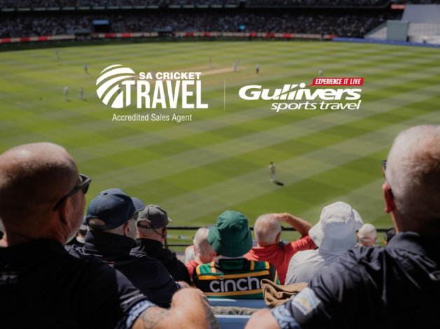 Two Gullivers Sports Travel tour members with a logo of South Africa Cricket official accredited travel agent. 